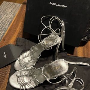 Yves Saint Laurent scrappy silver heels.